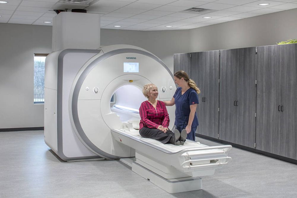 MRI machine with happy kid